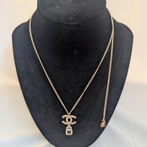 Chanel CC With Small Black Perfume with Pearl Necklace